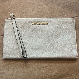 Jet Set Travel Large Perforated Wristlet- white